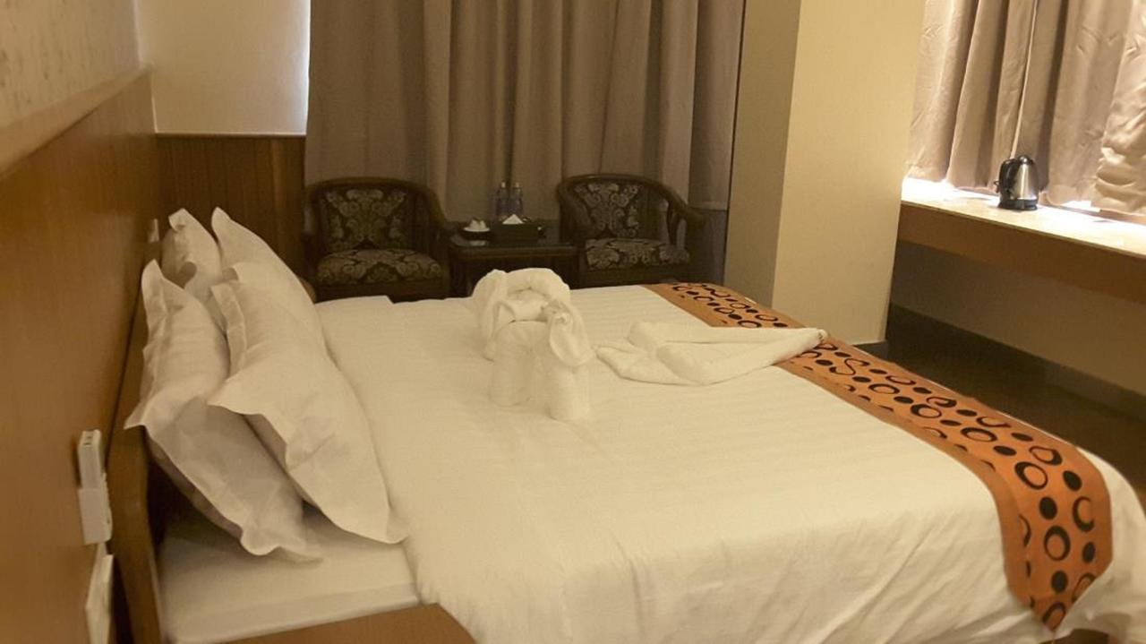 Unity Hotel Mandalay Extérieur photo