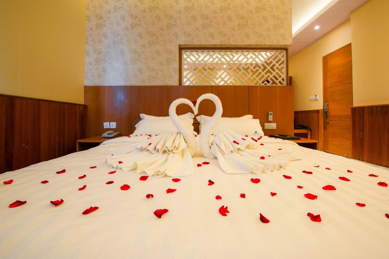 Unity Hotel Mandalay Extérieur photo